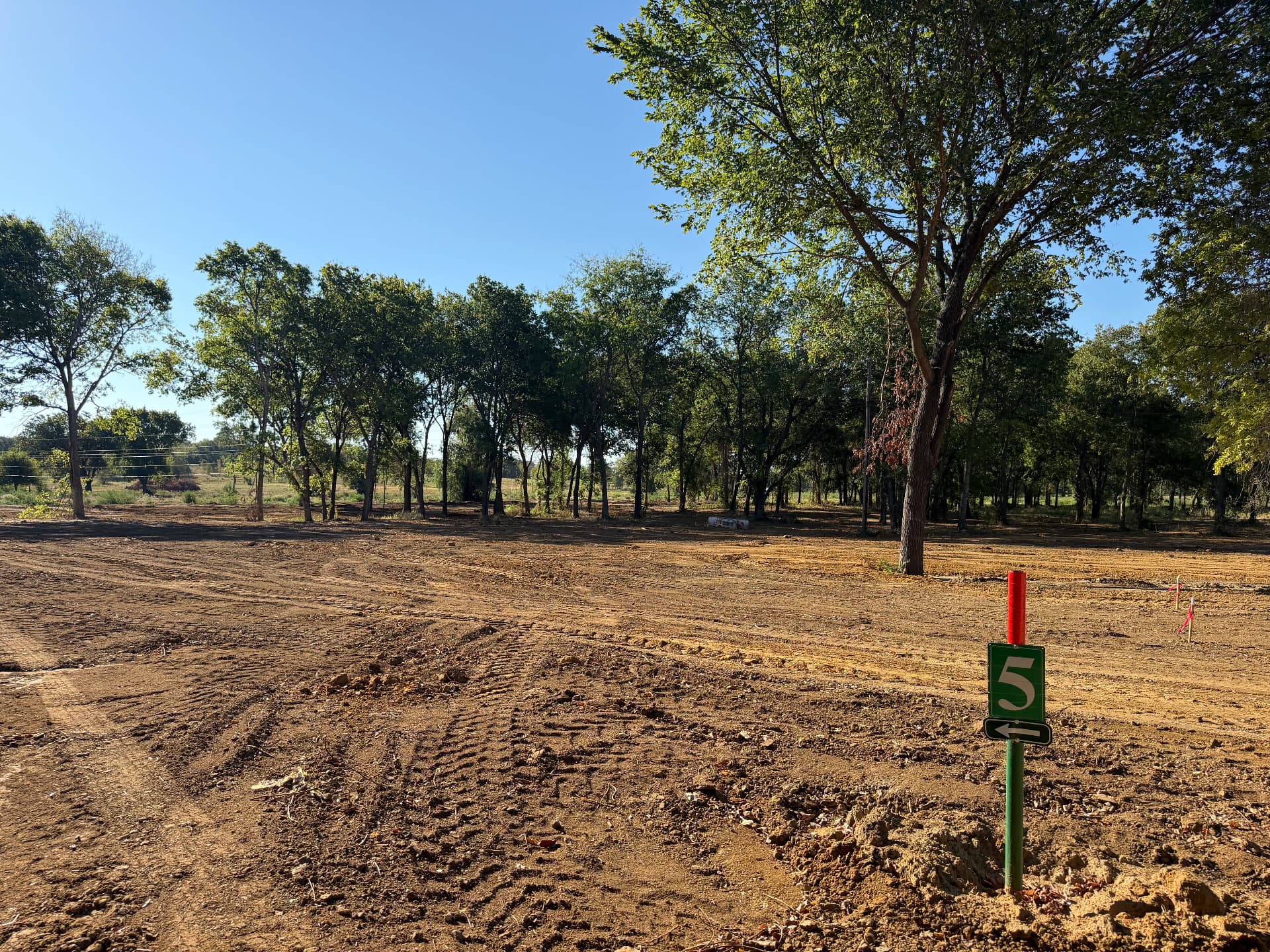 Tree-lined two-acre Lot 5 at The Summer Meadows
